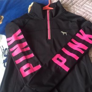 Pink and black half zip sweater